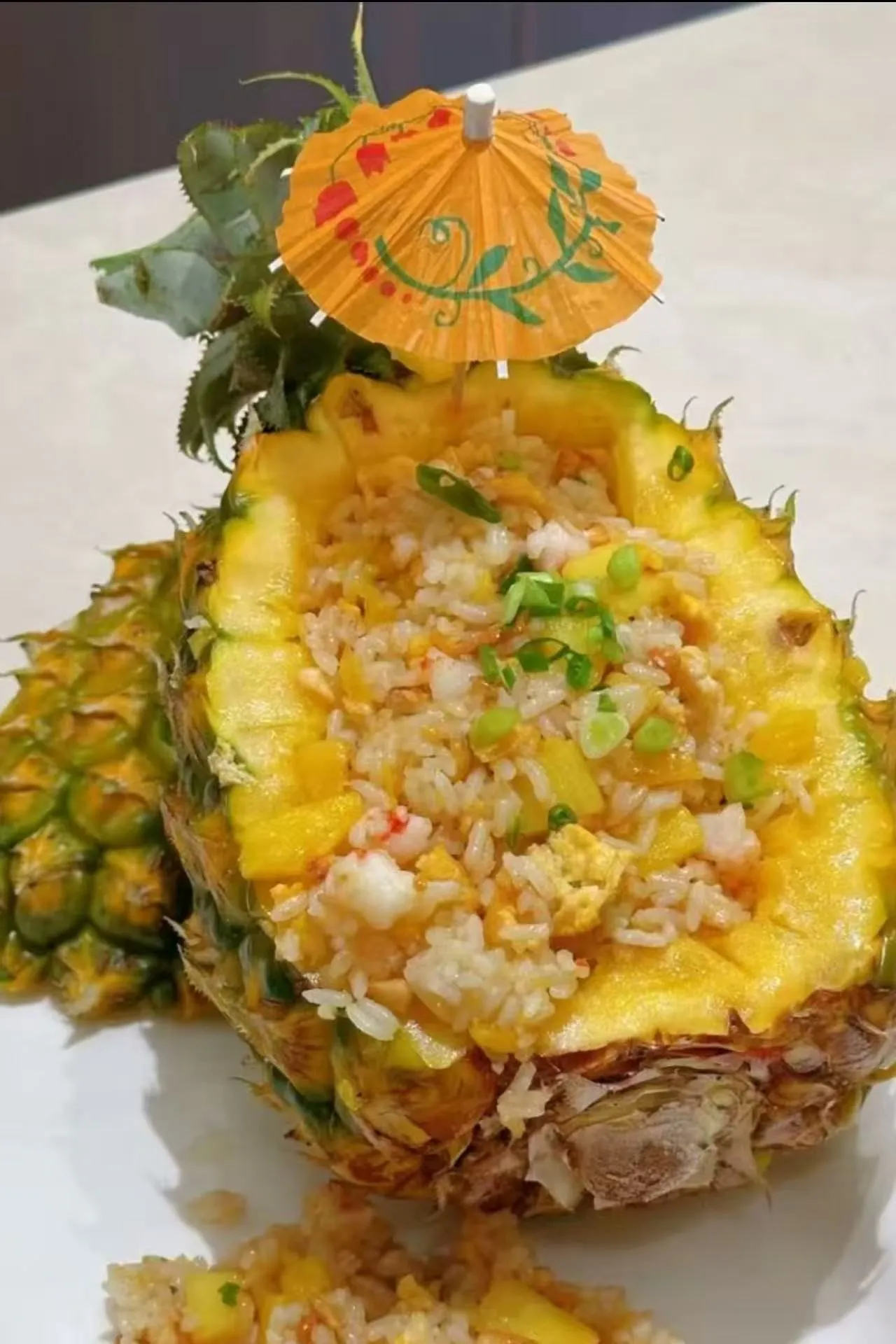 Pineapple fried rice served inside hollowed fresh pineapple fruit at Chengdu Impression Chinese Restaurant in Schenectady