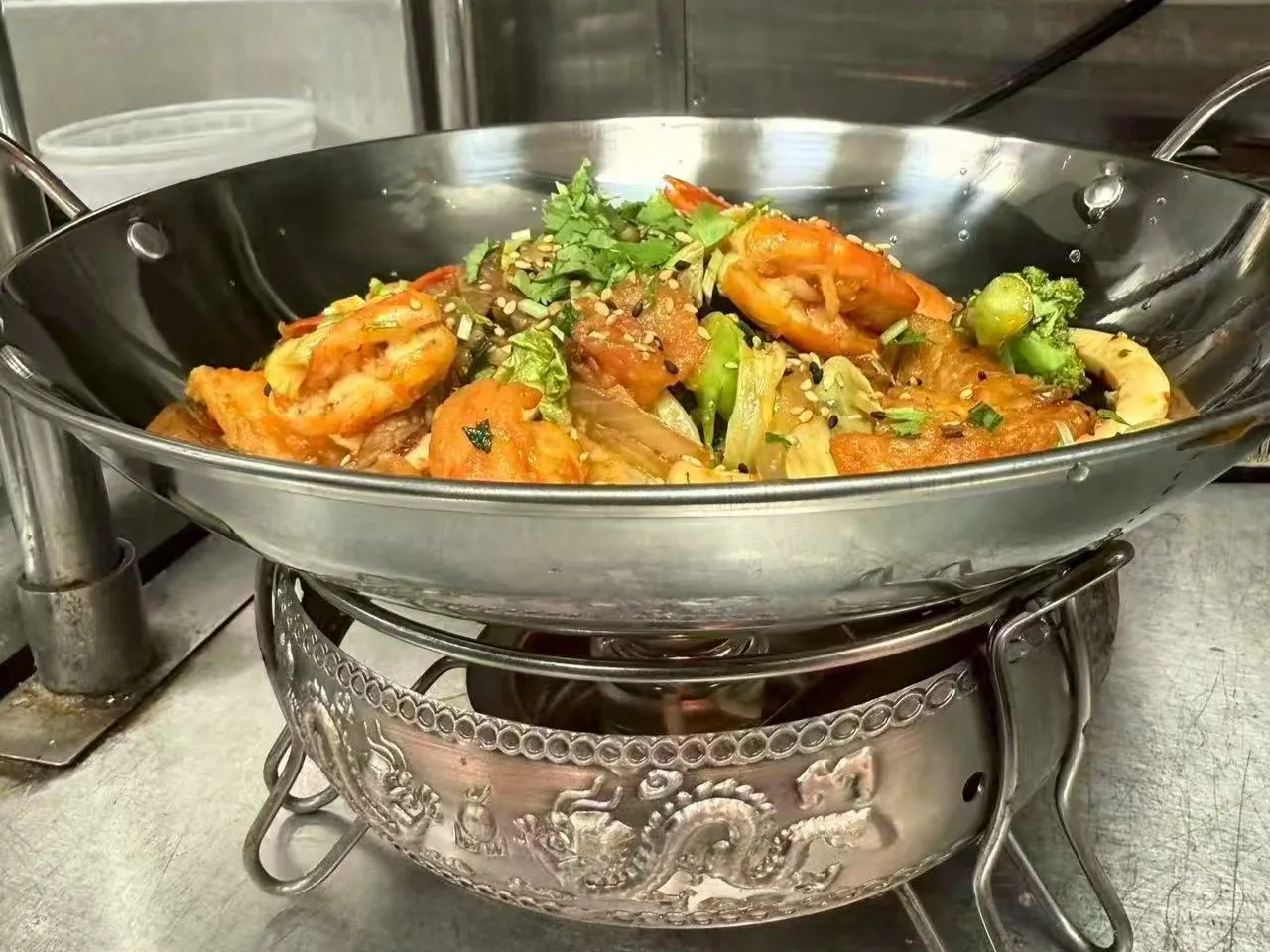 Stir-fried seafood hot pot with shrimp, veggies and sesame garnish at Chengdu Impression Chinese Restaurant in Schenectady
